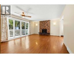 Living room - 944 Canna Crescent Sw, Calgary, AB T2W1N9 Photo 7