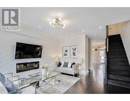 Family room - 24 Harold Lawrie Lane, Markham, ON L3T0G1 Photo 6
