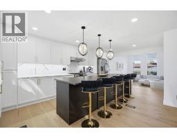 Kitchen - 76 Beaconsfield Way Nw, Calgary, AB T3K1X1 Photo 13