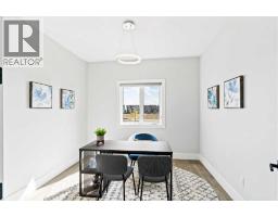 Living room - 16 Sunvalley View, Cochrane, AB T4C0X8 Photo 8