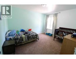 Bedroom - 5004 52 St, Taber, AB T1G1N2 Photo 6