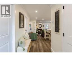 Welcome Home to 32 King Fisher Lane! On the left side of this entry, you'll find the door leading to the garage. To the right you will find a sizeable coat closet.
