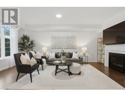 Family room - 14 Cornerside Way, Whitby, ON L1M0L8 Photo 9