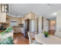 Eat in kitchen - 24 Shawcliffe Road Sw, Calgary, AB T2Y1G2 Photo 11