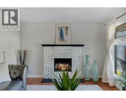 Living room - 24 Shawcliffe Road Sw, Calgary, AB T2Y1G2 Photo 6