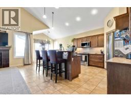 Recreational, Games room - 17 Dain Place Nw, Langdon, AB T0J1X1 Photo 11