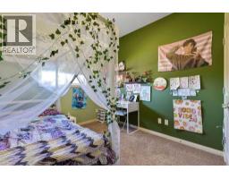 Bedroom - 17 Dain Place Nw, Langdon, AB T0J1X1 Photo 7