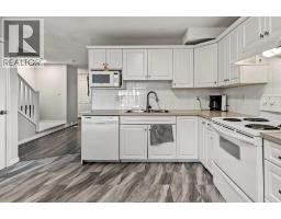 Laundry room - 6219 18a Street Se, Calgary, AB T2C0N2 Photo 11