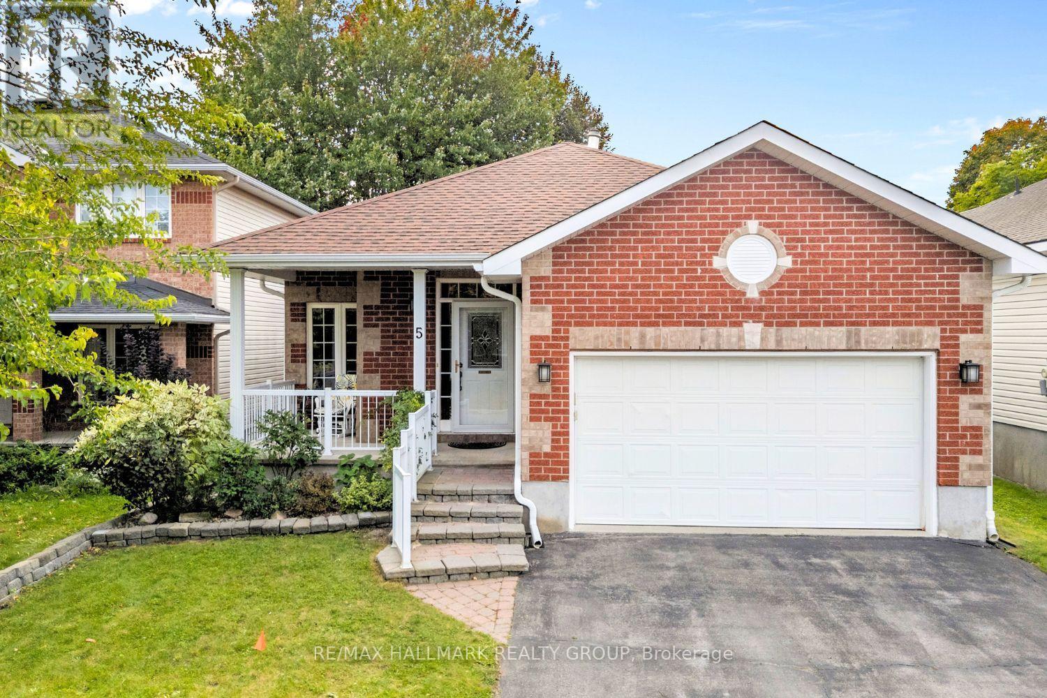 Front exterior with double garage and driveway