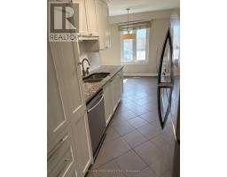 Bedroom 2 - 104 - 900 Central Park Drive, Brampton, ON L6S3J6 Photo 6