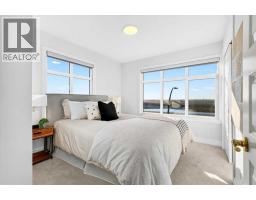 209, 414 Seton Passage Se, Calgary, AB T3M2M3 Photo 31