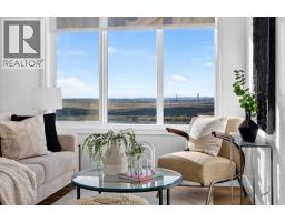 Primary Bedroom - 209, 414 Seton Passage Se, Calgary, AB T3M2M3 Photo 9