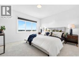 209, 414 Seton Passage Se, Calgary, AB T3M2M3 Photo 33