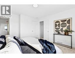 209, 414 Seton Passage Se, Calgary, AB T3M2M3 Photo 34