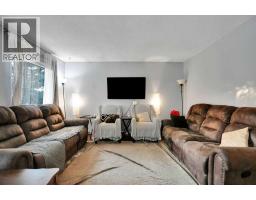 Living room - 3429 Cedarille Drive Sw, Calgary, AB T2W3J3 Photo 13