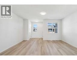 Great room - 71 Creekview Common Sw, Calgary, AB T2X4Y1 Photo 7