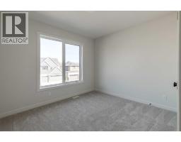 141 Creekstone Hill Sw, Calgary, AB T2X5G6 Photo 27