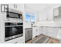 Laundry room - 35 Silverton Glen Green Sw, Calgary, AB T2X5B7 Photo 8
