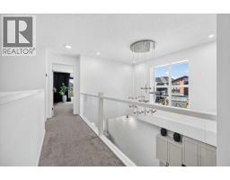 Laundry room - 182 Mitchell Road Nw, Calgary, AB T2X5T6 Photo 11