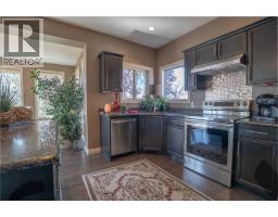 Family room - 460 Sunset Link, Crossfield, AB T0M0S0 Photo 14