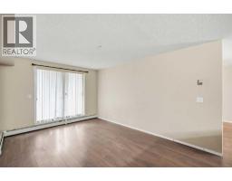 Living room - 4103, 60 Panatella Street Nw, Calgary, AB T3K0M4 Photo 7