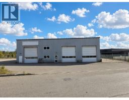 Front exterior of 9122 ROCK ISLAND ROAD · Prince George, BC