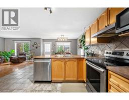 Family room - 163 West Lakeview Passage, Chestermere, AB T1X1G8 Photo 12