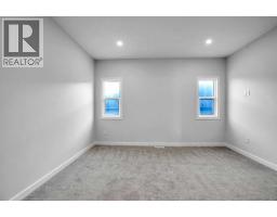 183 Heritage Court, Cochrane, AB T4C2N5 Photo 24