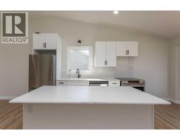 Family room - 133 Wellington Close, Blackfalds, AB T0M0J0 Photo 10