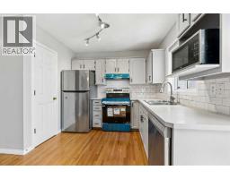 2pc Bathroom - 10433 Hidden Valley Drive Nw, Calgary, AB T3A5M2 Photo 10