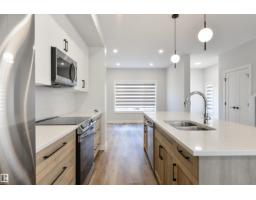 Laundry room - 8313 76 Av Nw, Edmonton, AB T6C0H9 Photo 9