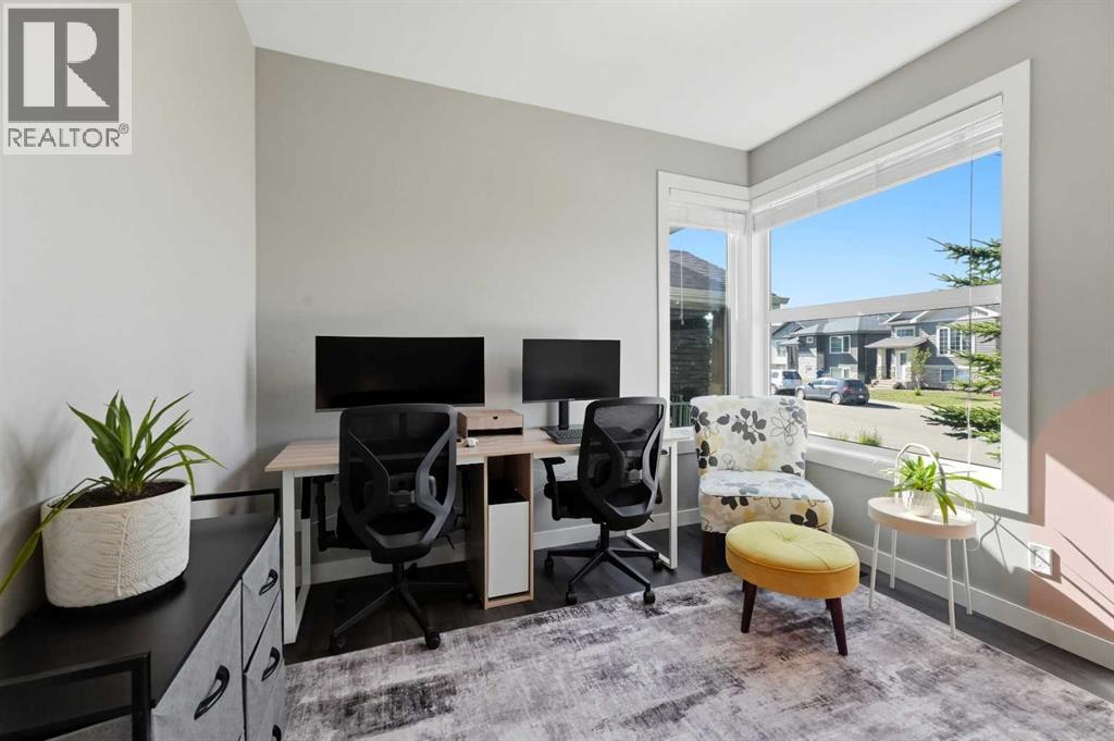 A versatile front office, which could also be used as a bedroom if desired