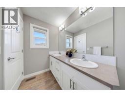 115 Heartland Boulevard, Cochrane, AB T4C2R1 Photo 26