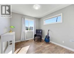 115 Heartland Boulevard, Cochrane, AB T4C2R1 Photo 29