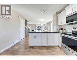 115 Heartland Boulevard, Cochrane, AB T4C2R1 Photo 20