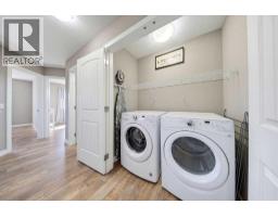 115 Heartland Boulevard, Cochrane, AB T4C2R1 Photo 32