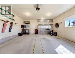 115 Heartland Boulevard, Cochrane, AB T4C2R1 Photo 47