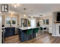 Kitchen - 12164 Lake Michigan Road Se, Calgary, AB T2J3G3 Photo 10