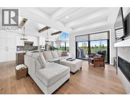 Living room - 435 Grayling Lane, Rural Rocky View County, AB T3Z0G7 Photo 9