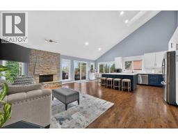 Kitchen - 876 Shawnee Drive Sw, Calgary, AB T2Y1X3 Photo 10