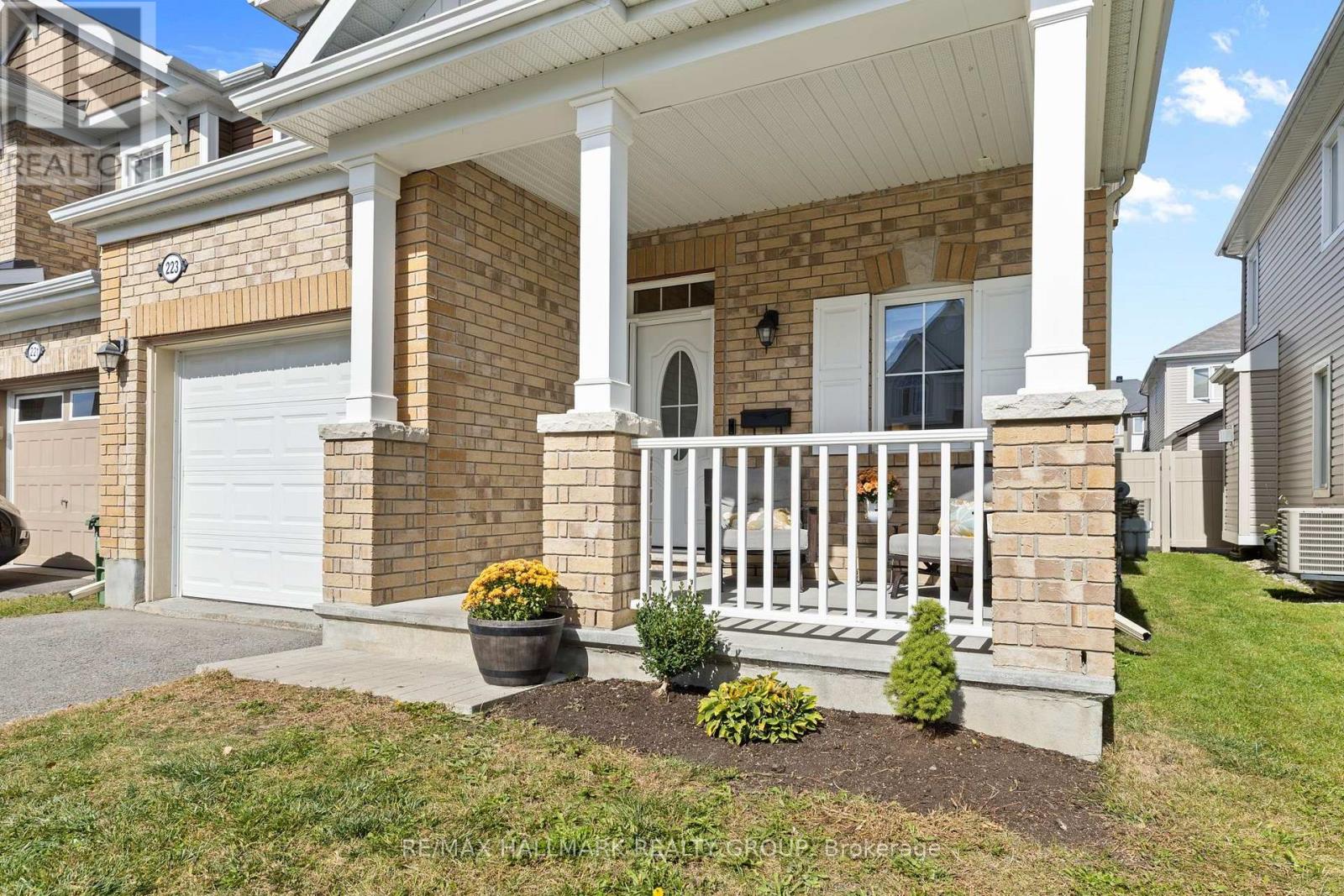 Enclosed front porch and brick exterior
