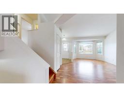 Family room - 108 Pinnacle Boulevard, Grande Prairie, AB T8W2V7 Photo 9