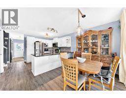 Family room - 148 Creek Gardens Close Nw, Airdrie, AB T4B2R5 Photo 13
