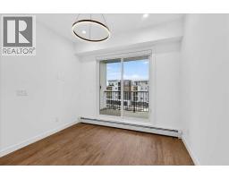 2412, 265 Wolf Willow Boulevard SE - photo 3