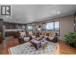 Living room - 173 Pantego Road Nw, Calgary, AB T3K0B8 Photo 8