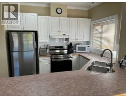Laundry room - 303, 1902 23 Street, Didsbury, AB T0M0W0 Photo 6