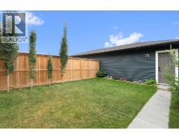 49 River Heights Drive, Cochrane, AB T4C0Y1 Photo 36