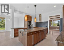 Laundry room - 4 Norris Coulee Loop, De Winton, AB T0L0X0 Photo 10