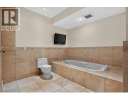 5pc Bathroom - 4 Norris Coulee Loop, De Winton, AB T0L0X0 Photo 27