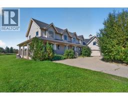 4 Norris Coulee Loop, De Winton, AB T0L0X0 Photo 37
